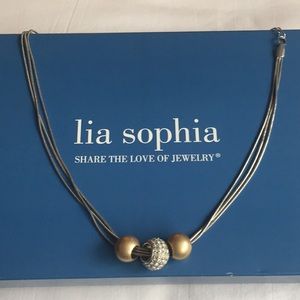 Three strand necklace with beads